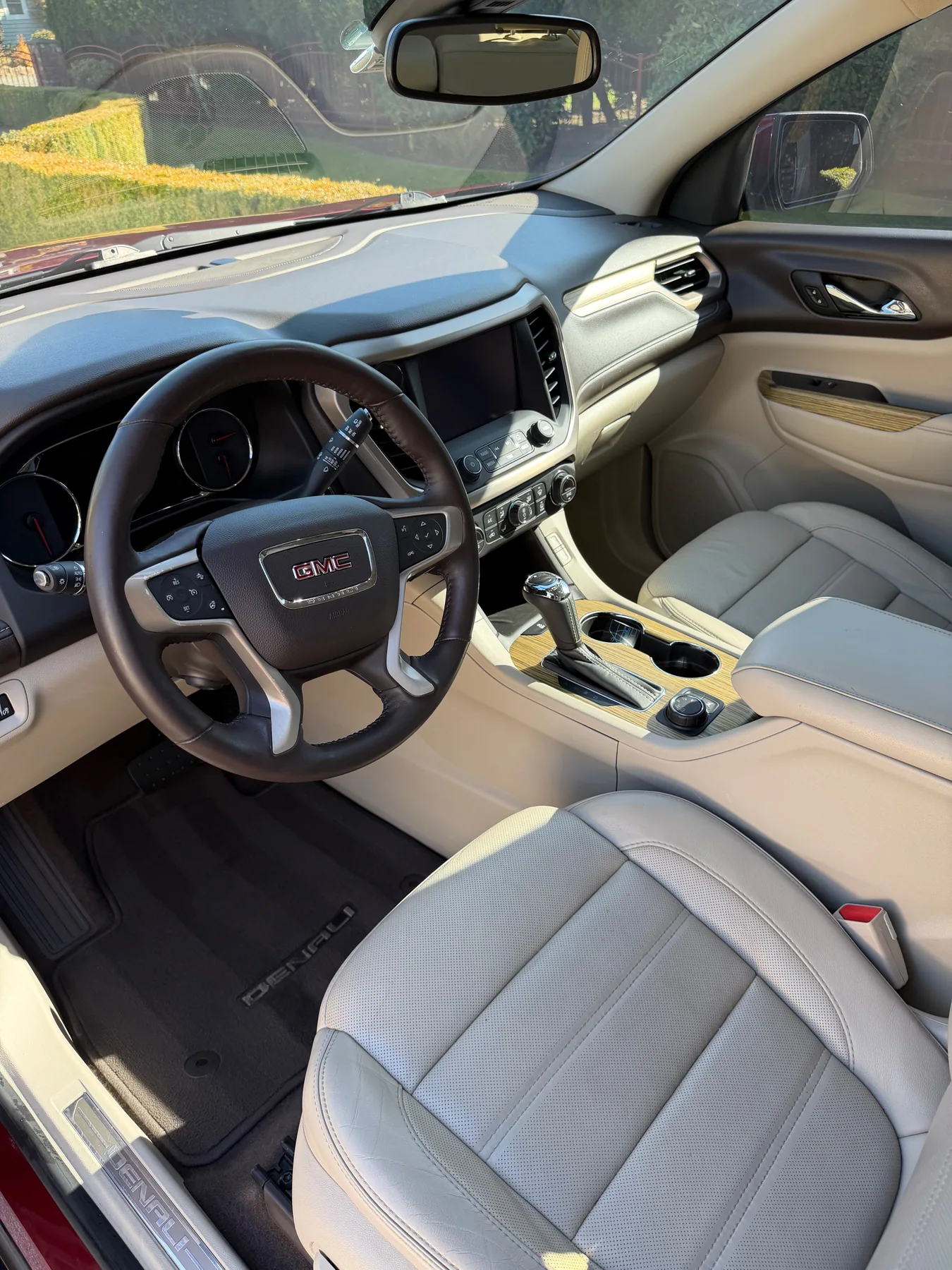 Detailed GMC interior with cleaned seats, dashboard, and center console