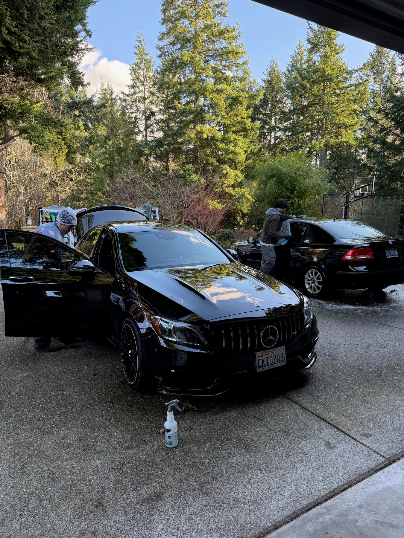 Black Mercedes finish showing clear reflections after detailing